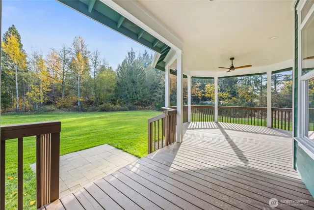 a view of a room with a large window