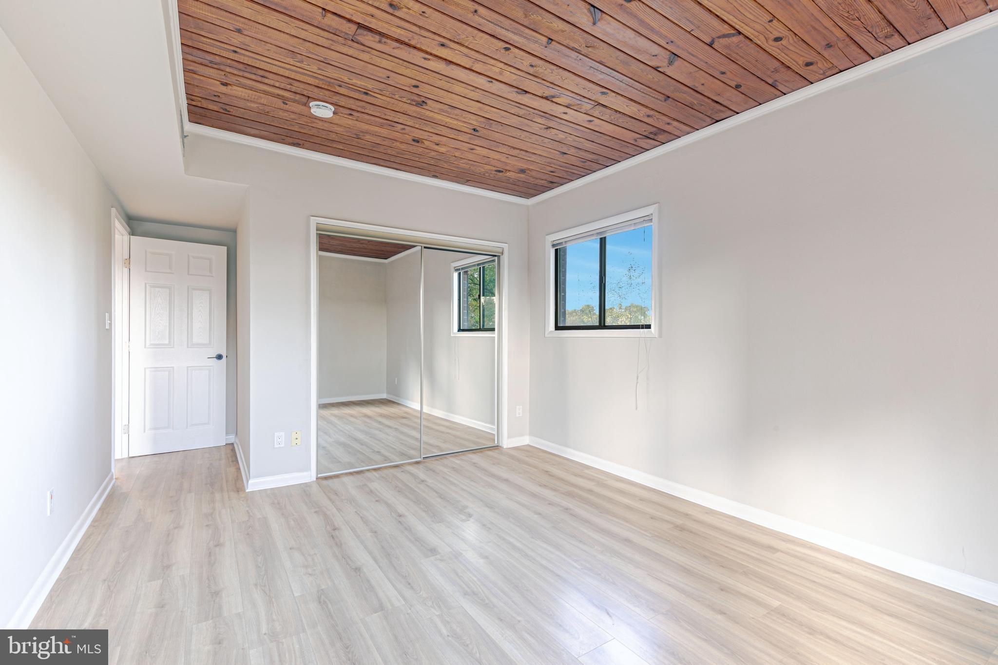 53 Skyhill Road, Unit 303 Alexandria, VA 22314 - Photo 13 of 22 wooden floor in an empty room
