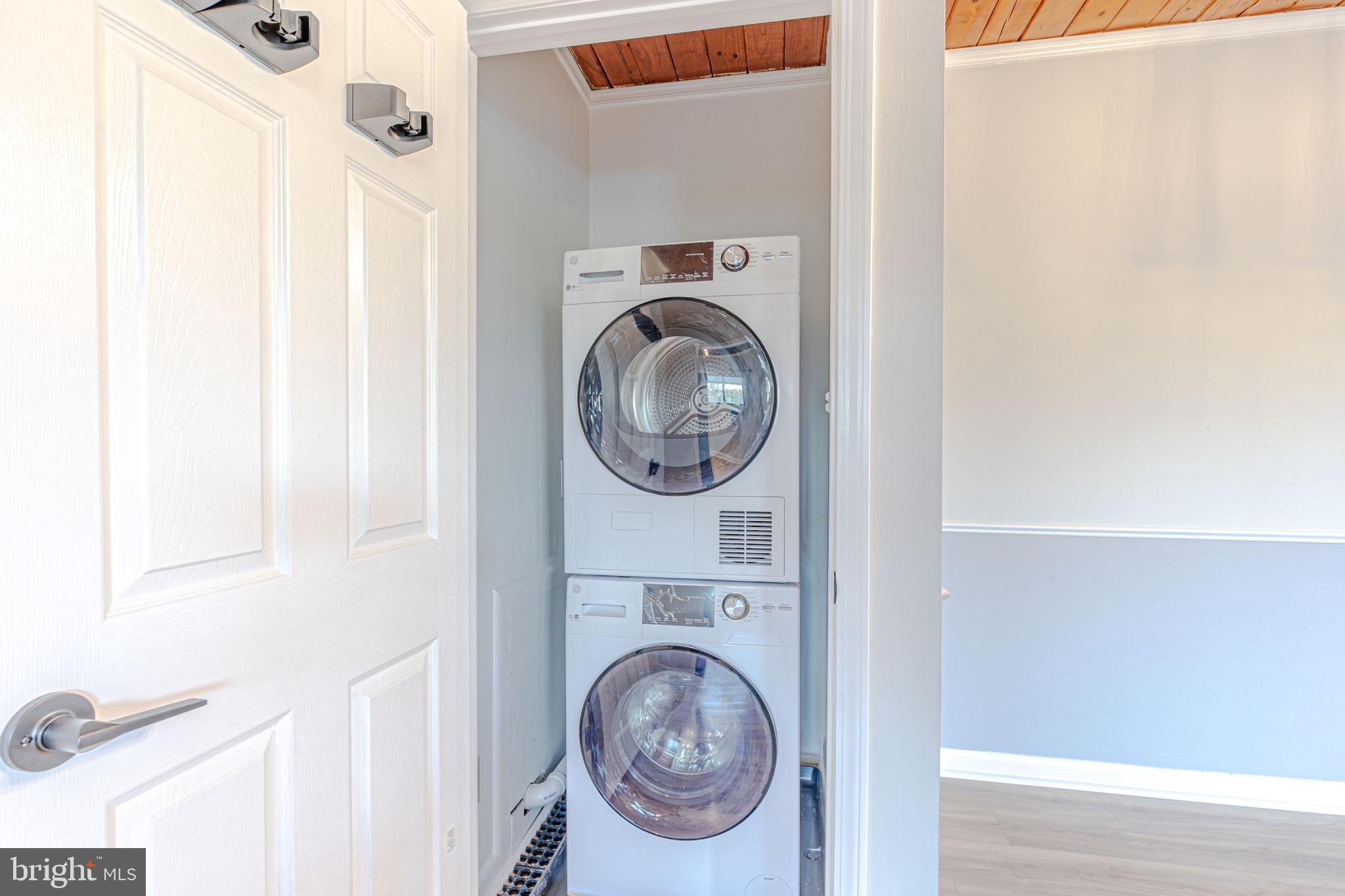 53 Skyhill Road, Unit 303 Alexandria, VA 22314 - Photo 17 of 22 a close view of a utility room with dryer and washer