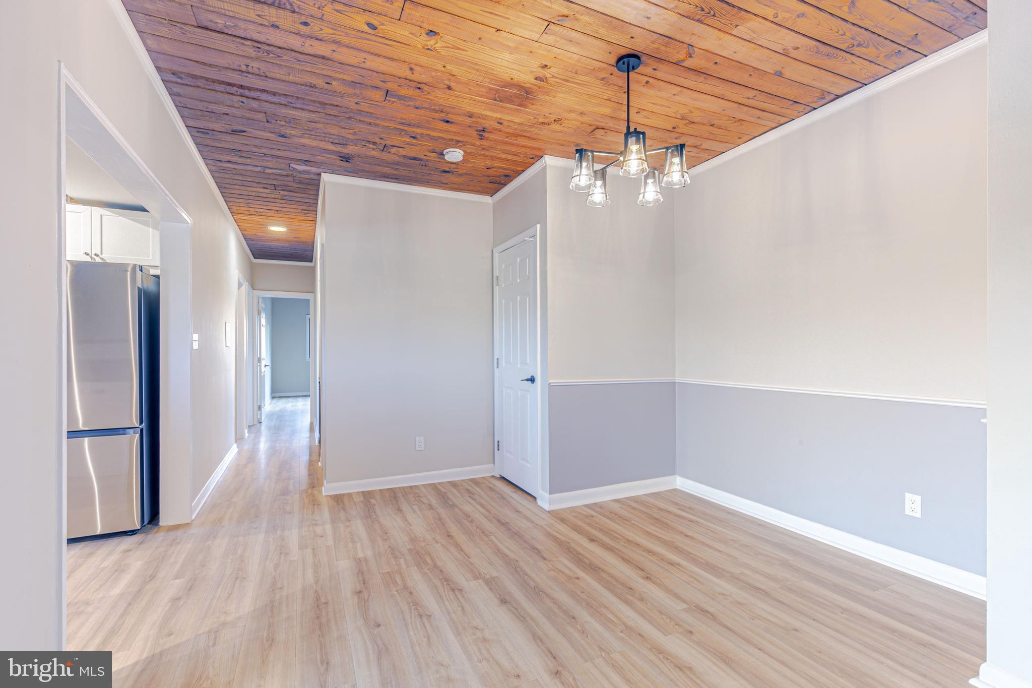 53 Skyhill Road, Unit 303 Alexandria, VA 22314 - Photo 3 of 22 a view of a livingroom with wooden floor