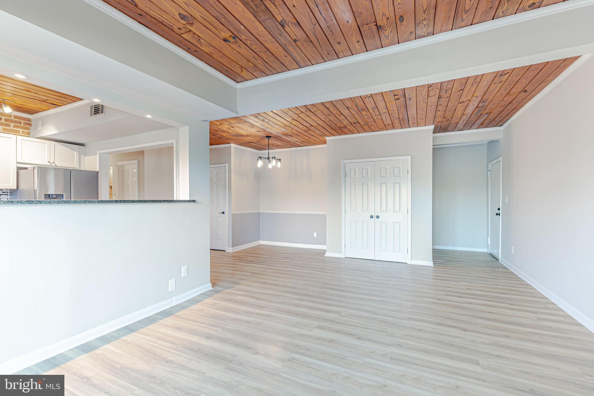 53 Skyhill Road, Unit 303 Alexandria, VA 22314 - Photo 4 of 22 a view of a livingroom with wooden floor