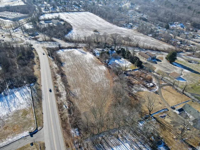 a view of a backyard of the house