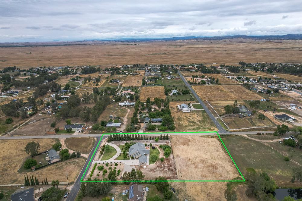 17465 Monreal Road Madera, CA 93636 - Photo 53 of 59 an aerial view of residential houses with outdoor space