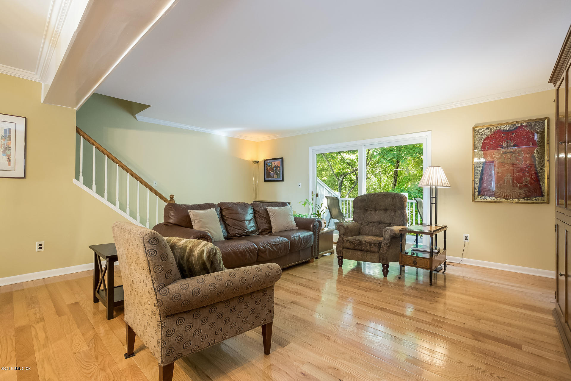 52 Stirrup Lane, Unit 52 Riverside, CT 06878 - Photo 4 of 30 a living room with furniture and a wooden floor