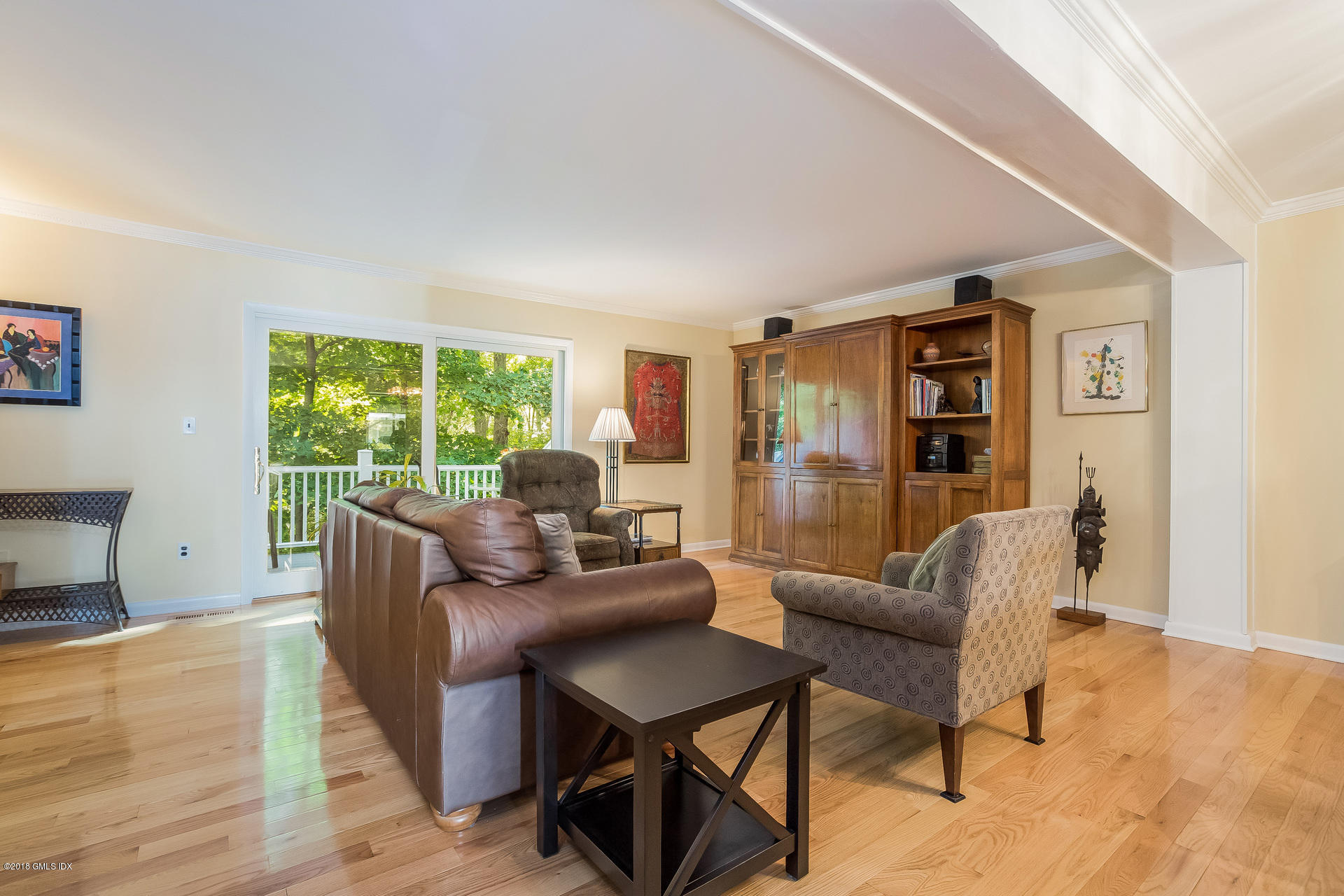 52 Stirrup Lane, Unit 52 Riverside, CT 06878 - Photo 6 of 30 a living room with furniture and a wooden floor