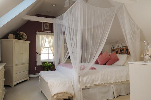 435 Walnut Plain Road Rochester, MA 02770 - Photo 8 of 8 a bedroom with a bed and a window