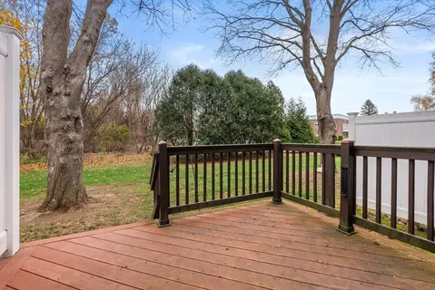 a view of a deck with a yard