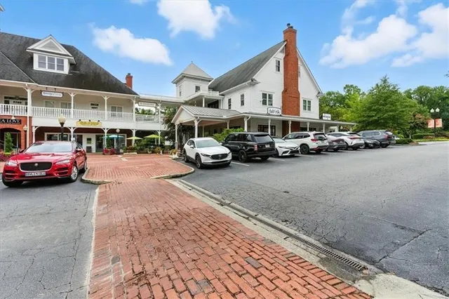 a view of street with parked cars