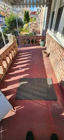 a kitchen with granite countertop a sink and cabinets