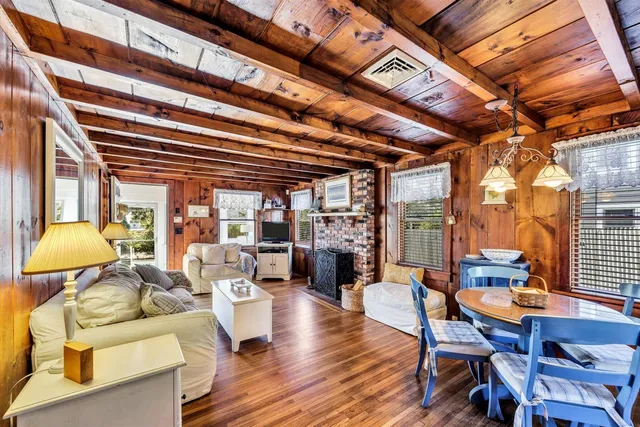 a outdoor dining space with furniture and stove