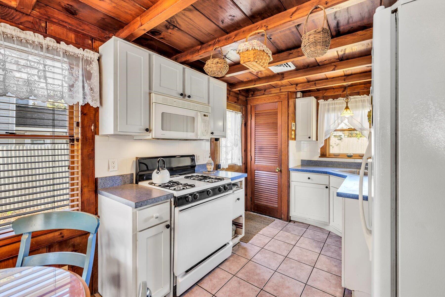2 Rita Mary Street West Dennis, MA 02670 - Photo 17 of 39 a kitchen with stainless steel appliances granite countertop a stove and a refrigerator