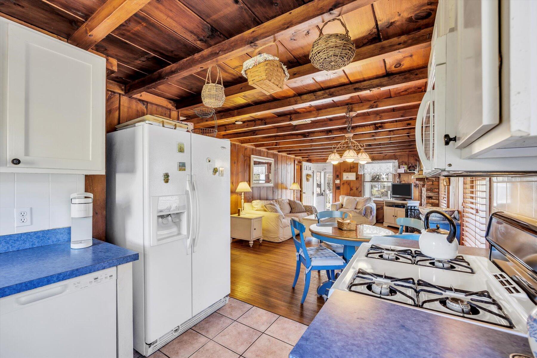 2 Rita Mary Street West Dennis, MA 02670 - Photo 19 of 39 a view of a kitchen with fridge and workspace