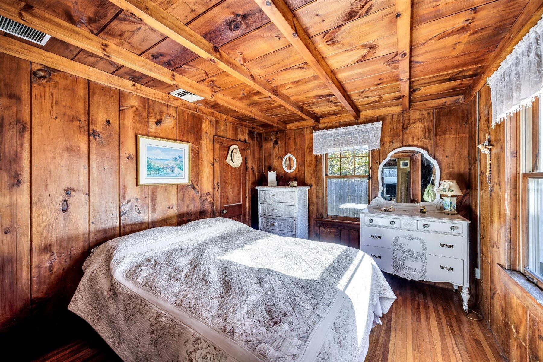 2 Rita Mary Street West Dennis, MA 02670 - Photo 26 of 39 a bedroom with a bed next to a window with outer view