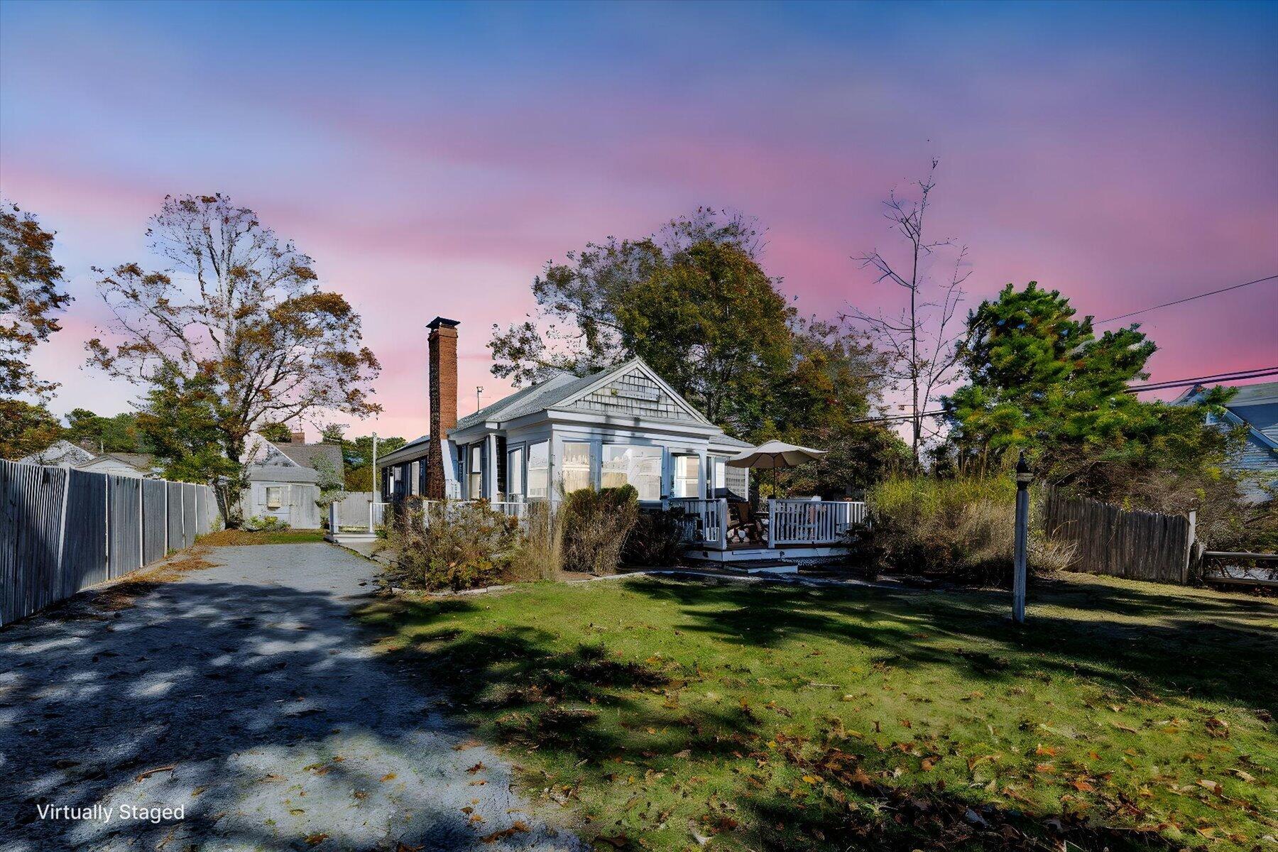 2 Rita Mary Street West Dennis, MA 02670 - Photo 7 of 39 a front view of a house with a yard