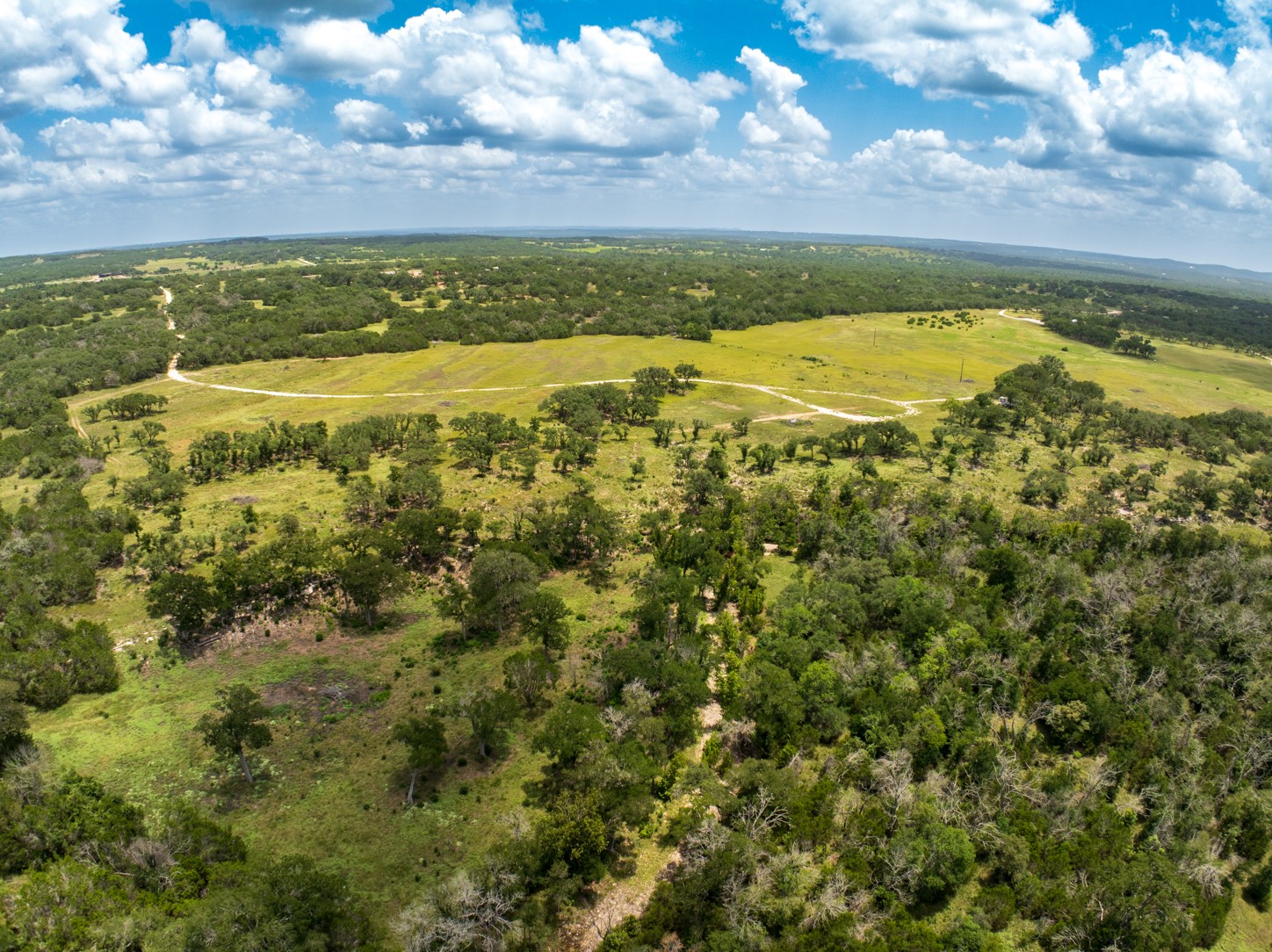 3979 Chimney Valley Road Blanco, TX 78606 - Photo 13 of 34 a view of an ocean and a mountain