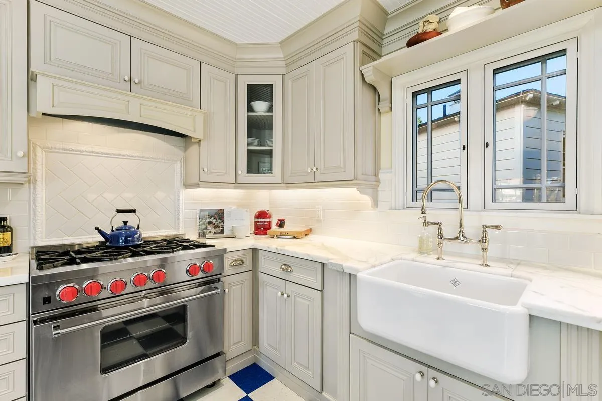 2254 Del Mar Heights Road Del Mar, CA 92014 - Photo 11 of 34 a kitchen with stove and cabinets