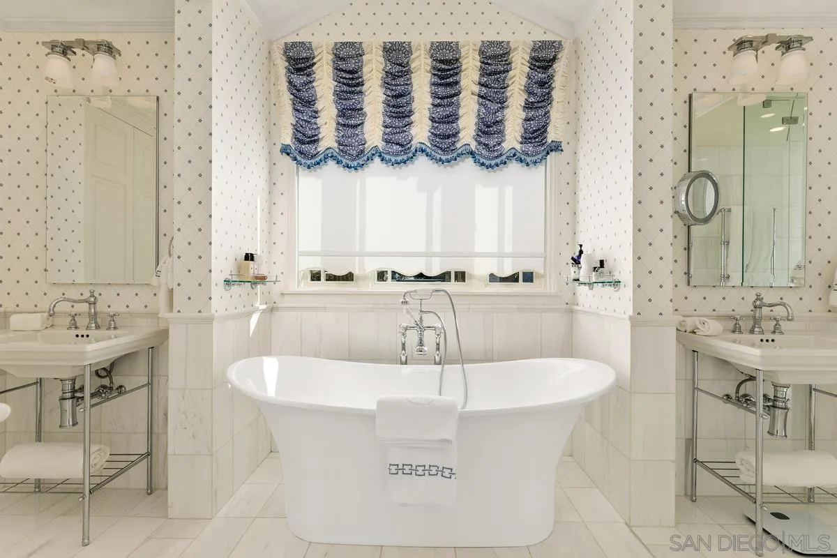 2254 Del Mar Heights Road Del Mar, CA 92014 - Photo 21 of 34 a bathroom with a bathtub and sink