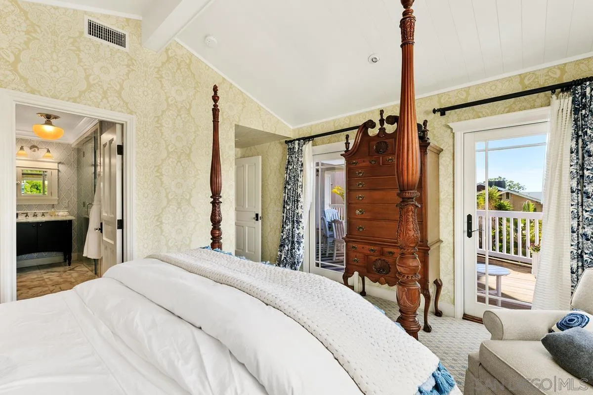 2254 Del Mar Heights Road Del Mar, CA 92014 - Photo 26 of 34 a bedroom with a bed window and a flat tv screen