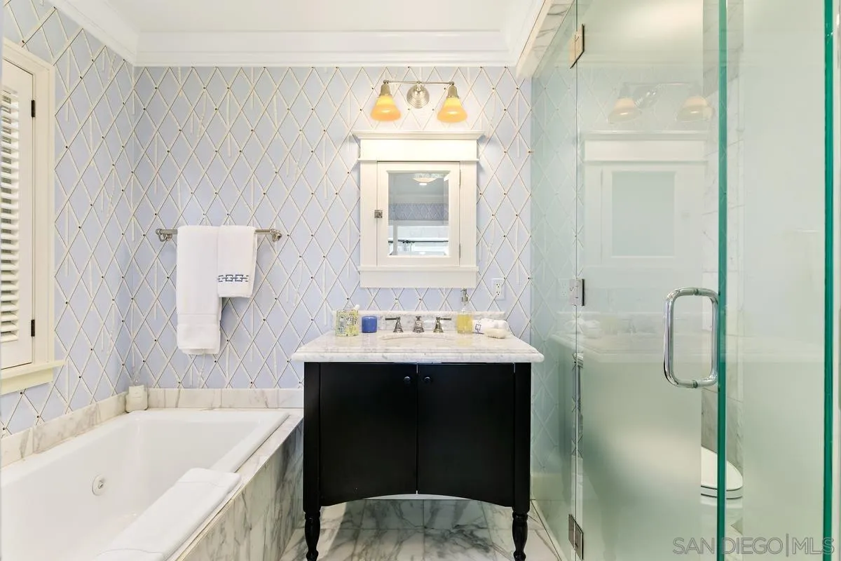2254 Del Mar Heights Road Del Mar, CA 92014 - Photo 27 of 34 a bathroom with a sink and a bathtub