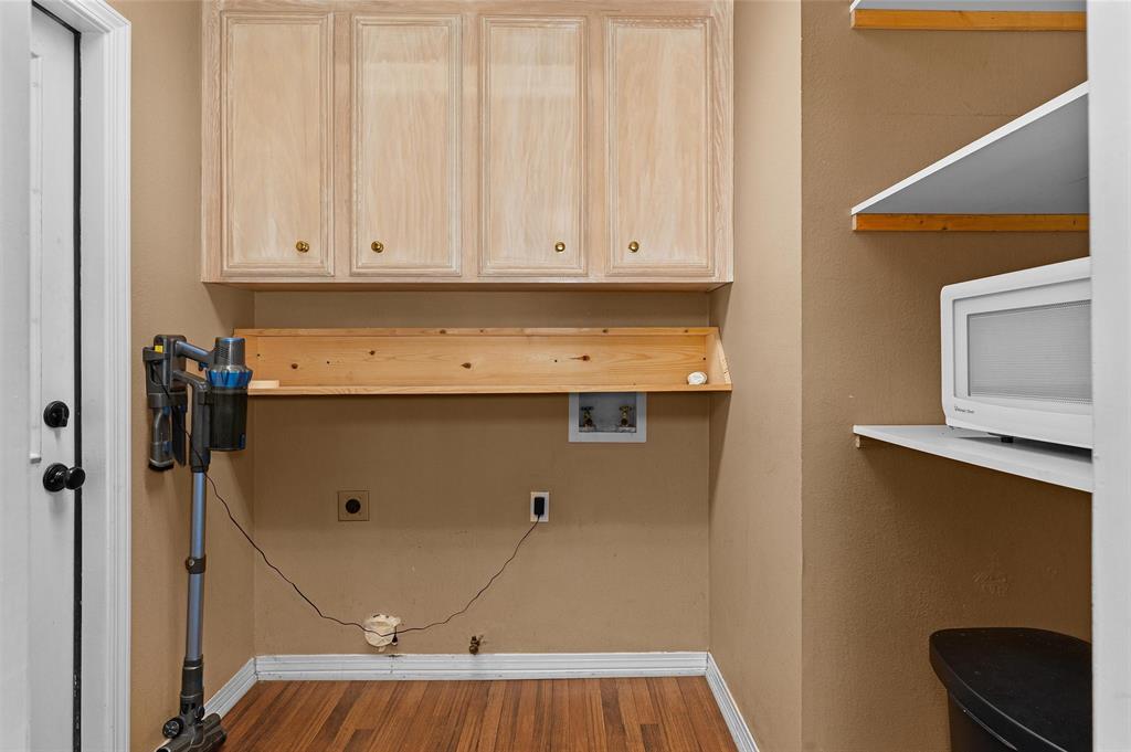 9720 Locust Hill Road Greenwood, LA 71033 - Photo 17 of 31 a room with a sink and cabinets