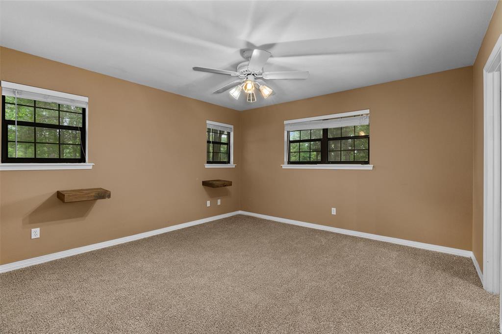 9720 Locust Hill Road Greenwood, LA 71033 - Photo 20 of 31 a view of an empty room with a window