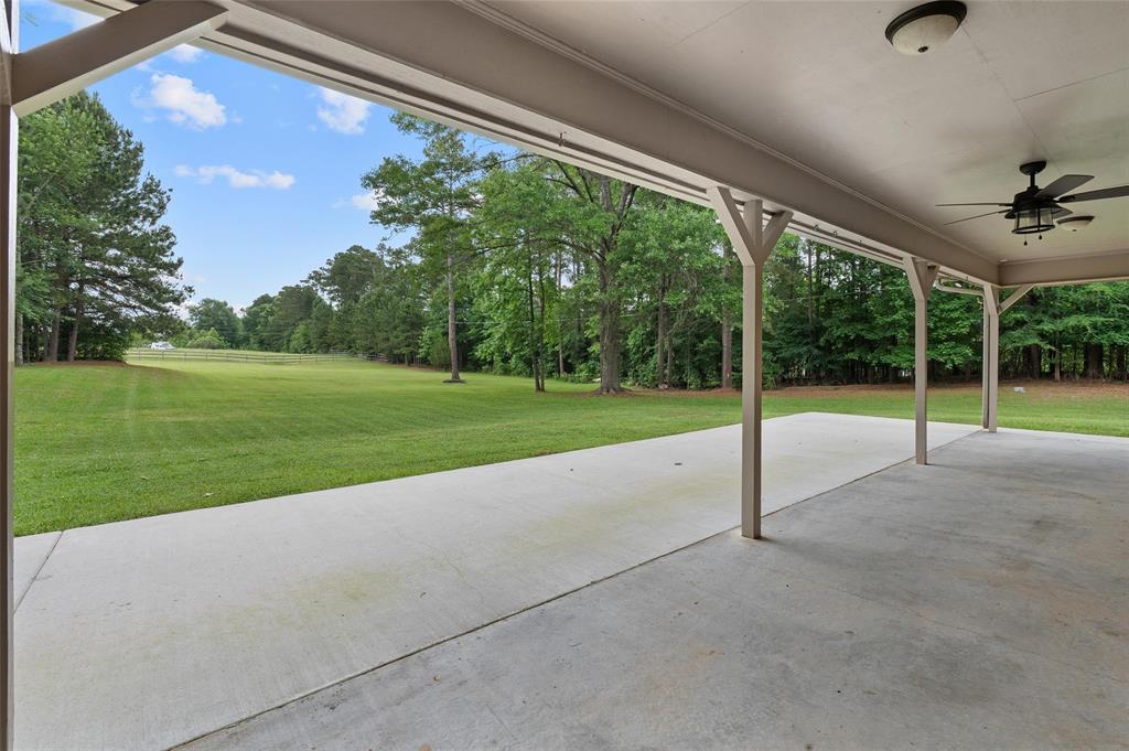 9720 Locust Hill Road Greenwood, LA 71033 - Photo 29 of 31 a view of a house with a big yard
