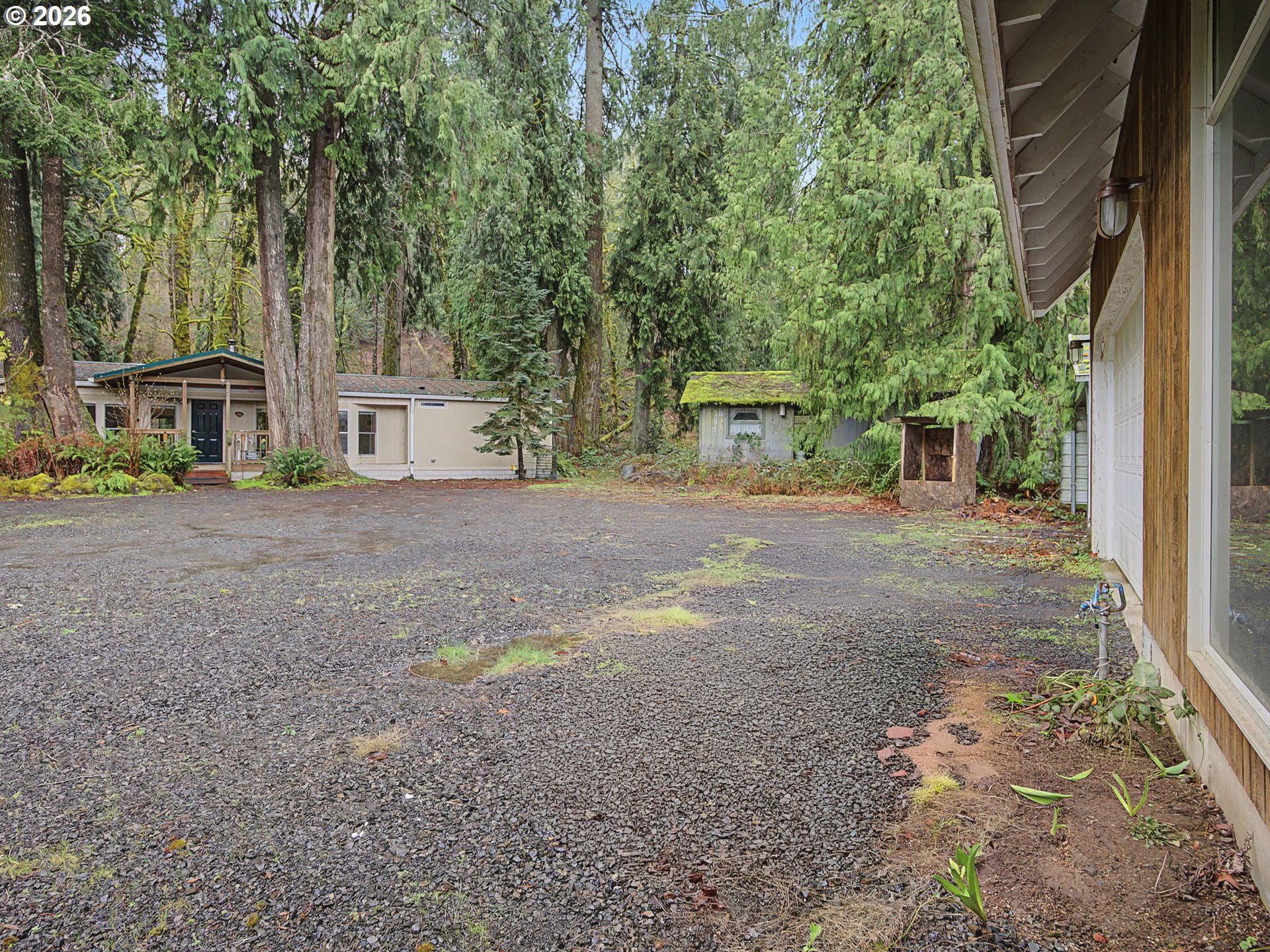 41180 Southeast Kubitz Road Sandy, OR 97055 - Photo 25 of 35 a view of a house with backyard and a tree