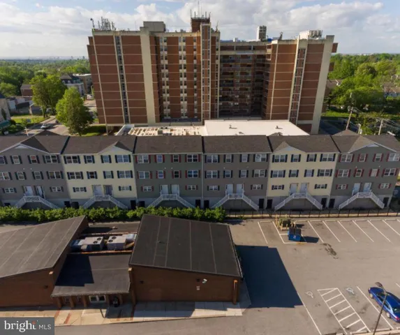 a view of street with tall buildings