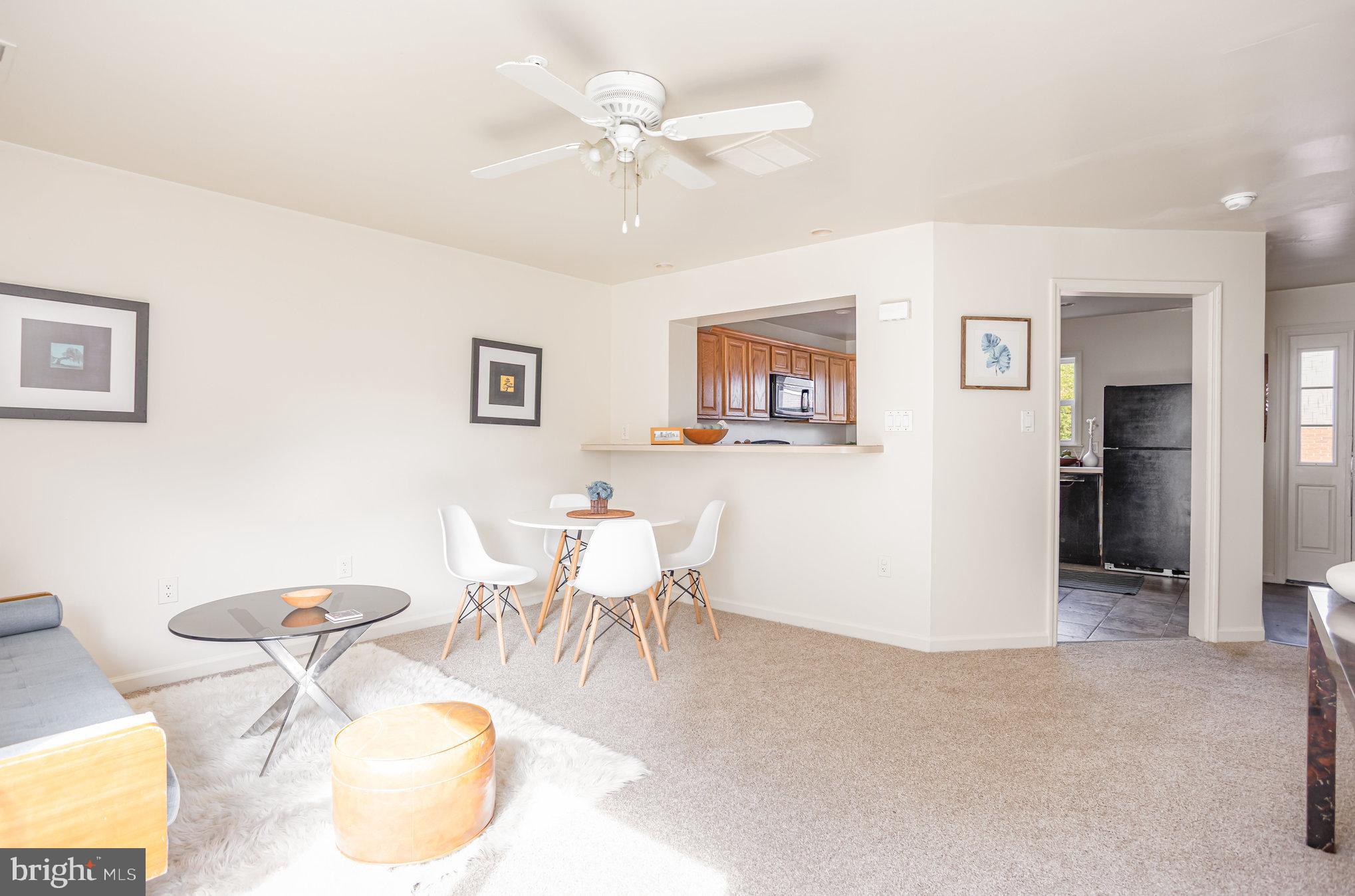 5237 Crowson Avenue, Unit 7 Baltimore, MD 21212 - Photo 2 of 18 a view of a dining room with furniture