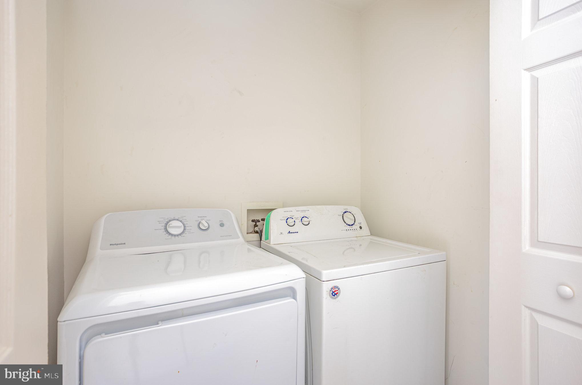 5237 Crowson Avenue, Unit 7 Baltimore, MD 21212 - Photo 9 of 18 a utility room with dryer and washer