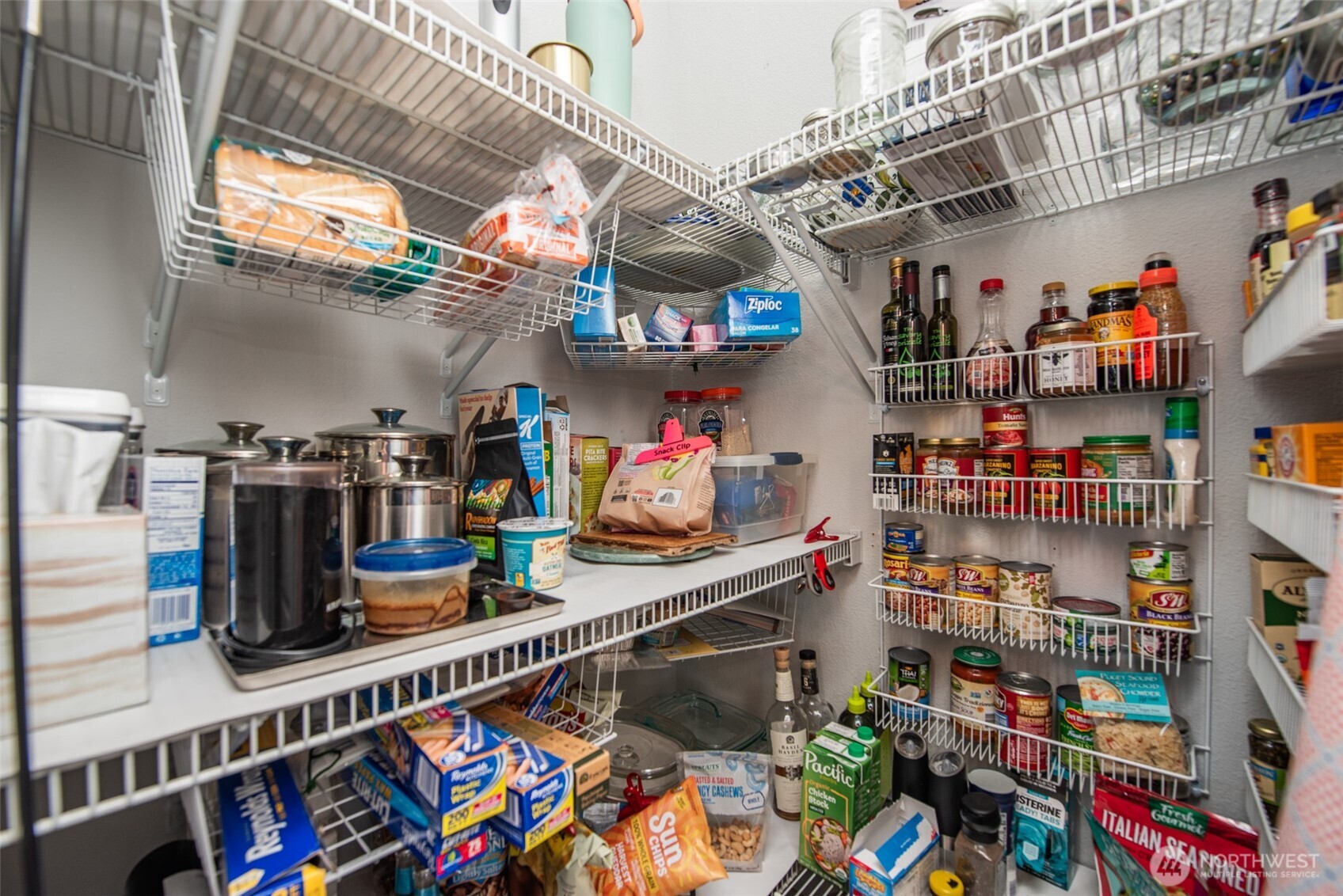 720 West Heritage Loop Sequim, WA 98382 - Photo 11 of 35 a store room with lots of clutter and vegetables
