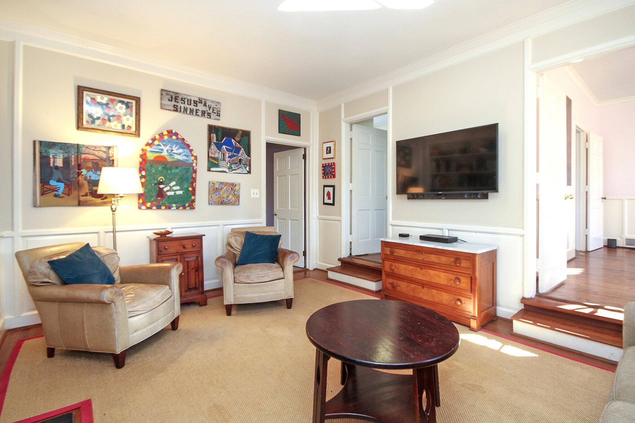 523 Ellsworth Road Charlotte, NC 28211 - Photo 10 of 41 a living room with furniture and a flat screen tv