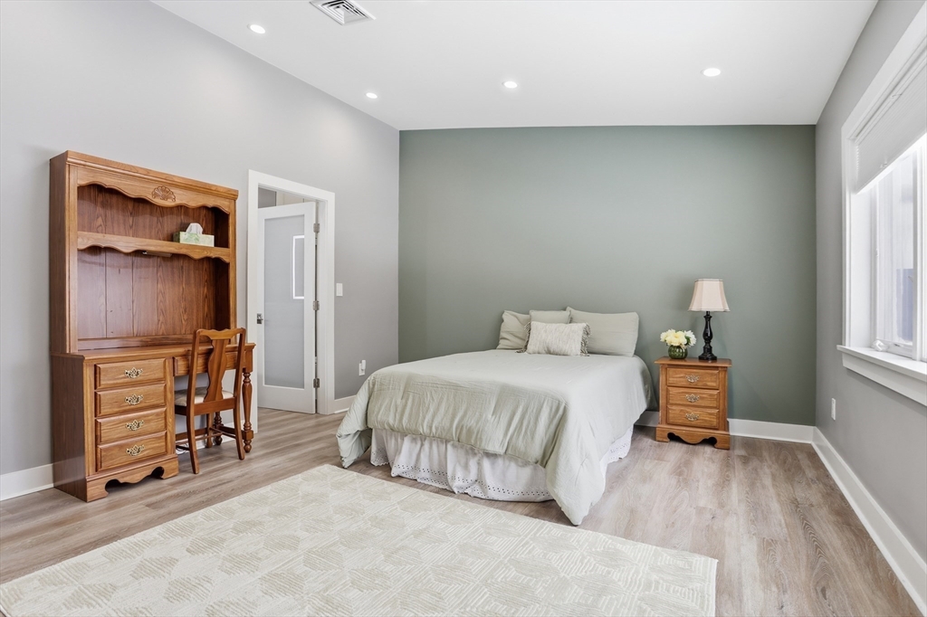 235 Kemp Street Dunstable, MA 01827 - Photo 22 of 42 a bedroom with a bed and a dresser