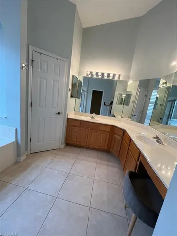 a room with a bed and a television in it