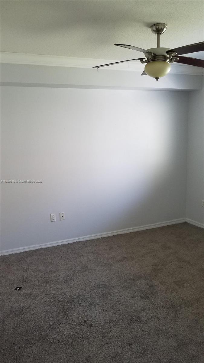 11050 Southwest 196th Street, Unit 305 Miami, FL 33157 - Photo 8 of 9 a view of an empty room