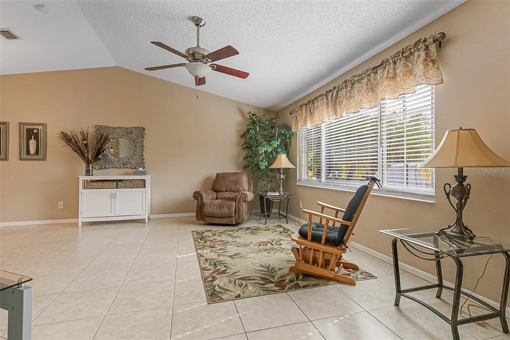 5740 Friendly Street Cocoa, FL 32927 - Photo 3 of 14 a workspace with furniture and window