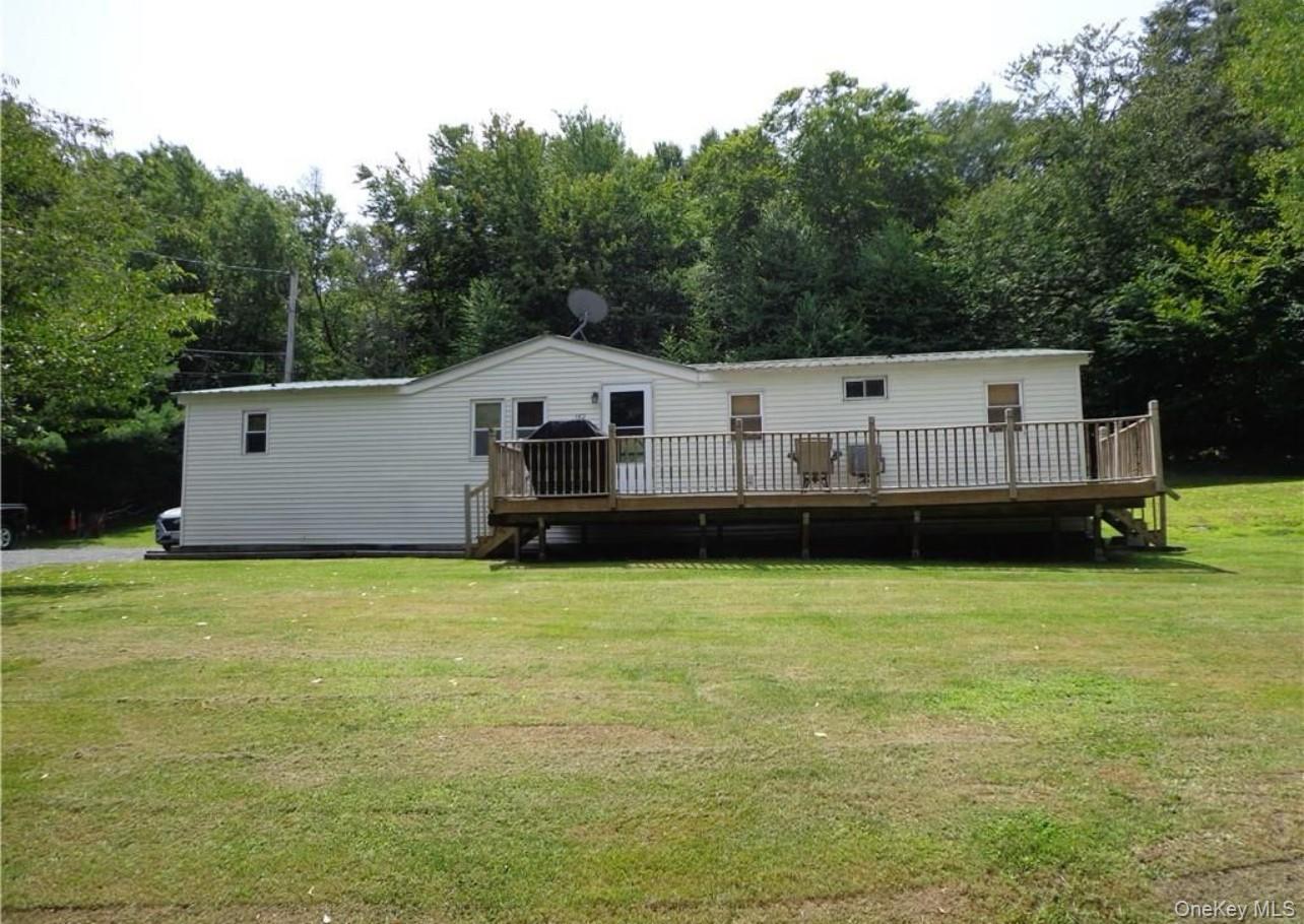 182-184 Mutton Hill Road Neversink, NY 12765 - Photo 1 of 34 a view of a house with a backyard