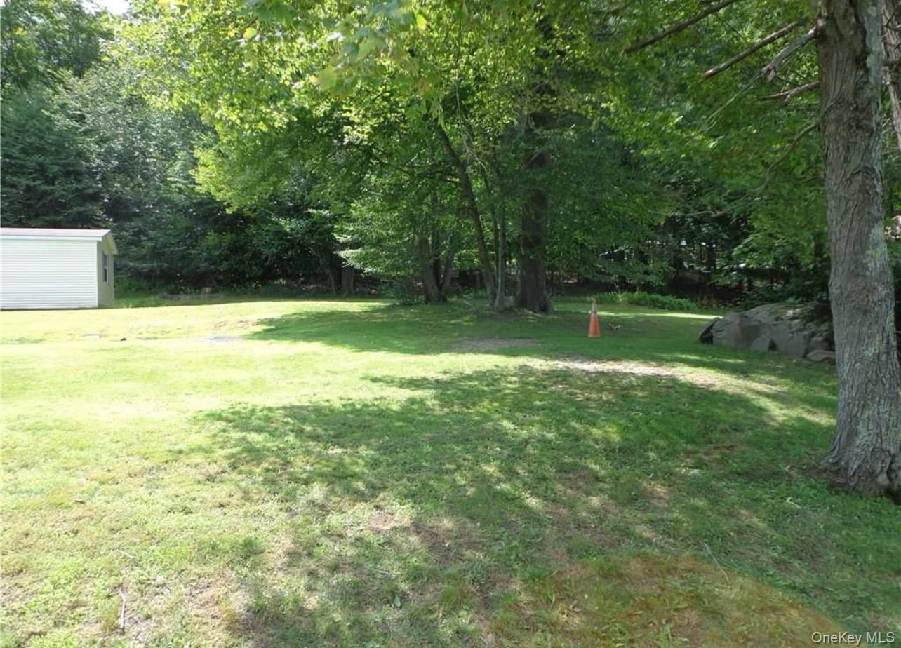 182-184 Mutton Hill Road Neversink, NY 12765 - Photo 22 of 34 a view of an outdoor space and a yard