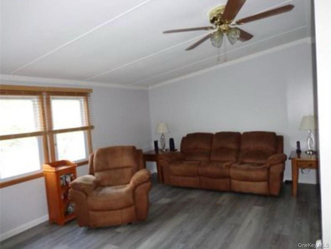 182-184 Mutton Hill Road Neversink, NY 12765 - Photo 5 of 34 a living room with furniture and a window