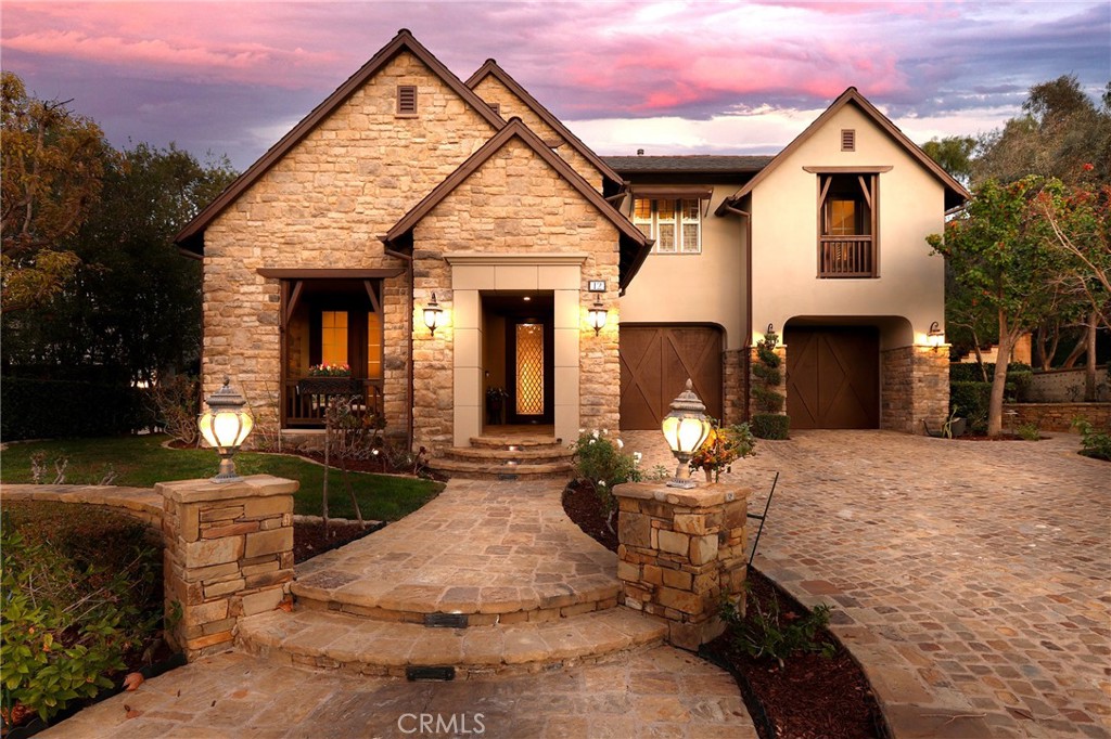 12 Basilica Place Ladera Ranch, CA 92694 - Photo 1 of 1 a front view of house with a yard and seating space