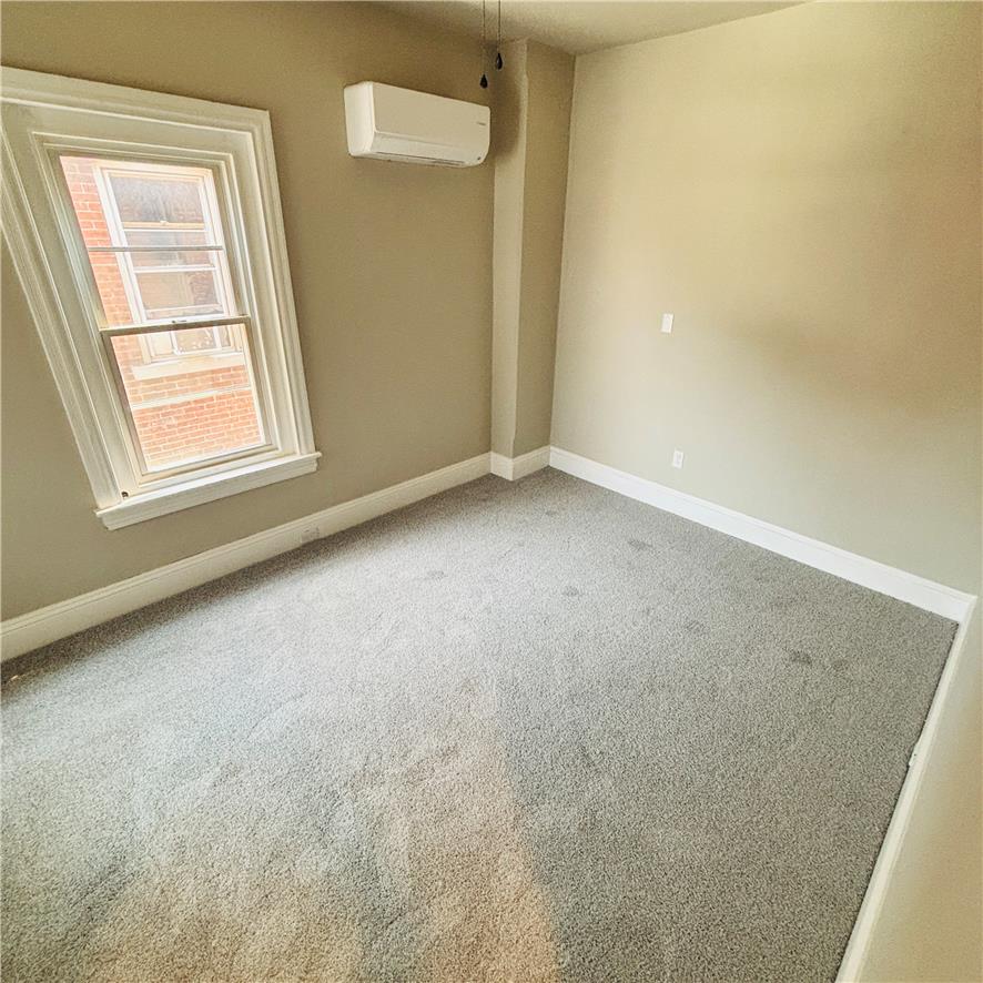 718 Linden Street Bethlehem, PA 18018 - Photo 13 of 19 A well-proportioned bedroom with ample natural light and plush carpeting.