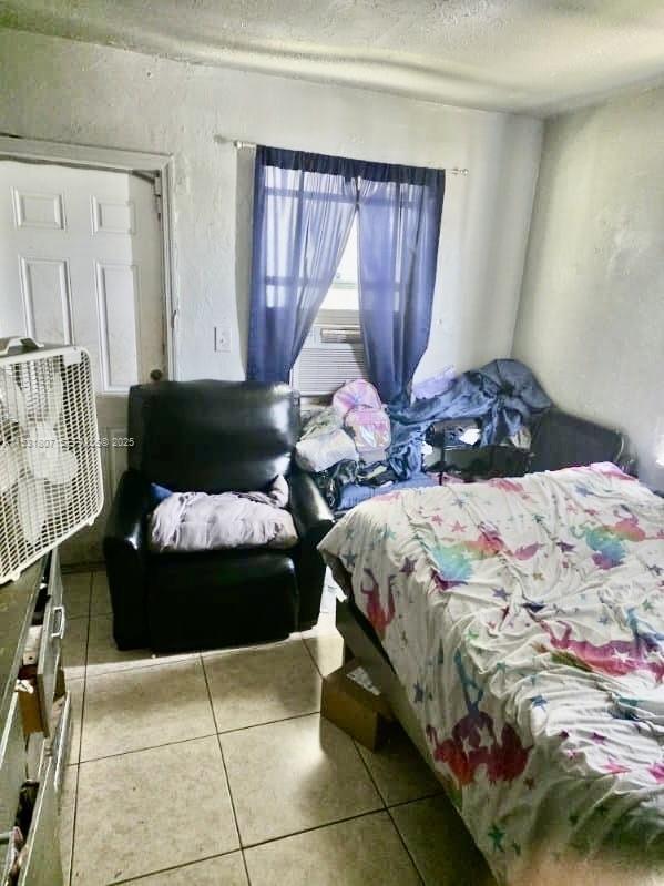 10280 Southwest 175th Street Miami, FL 33157 - Photo 8 of 10 a bedroom with bed and window