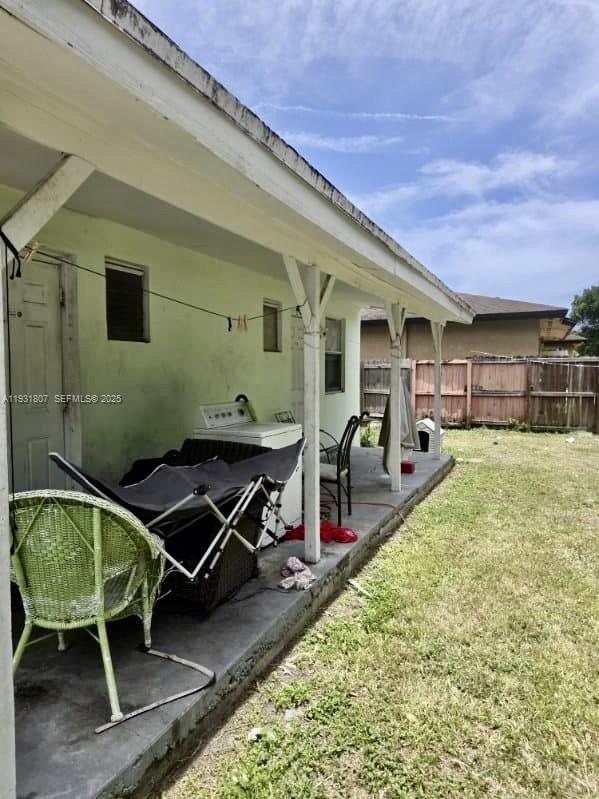10280 Southwest 175th Street Miami, FL 33157 - Photo 10 of 10 a view of a backyard with furniture and a patio