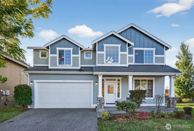 front view of a house with a yard