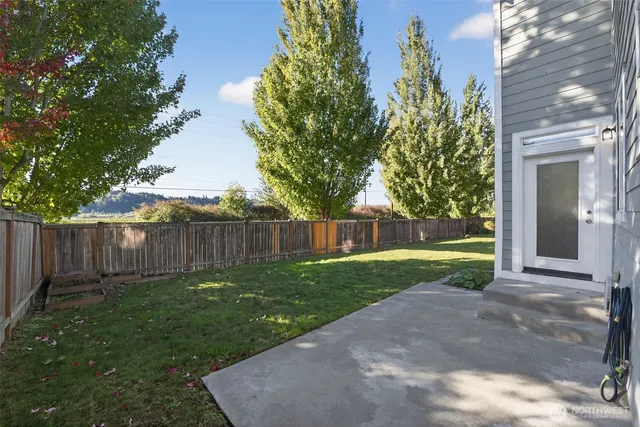a view of a backyard with a garden
