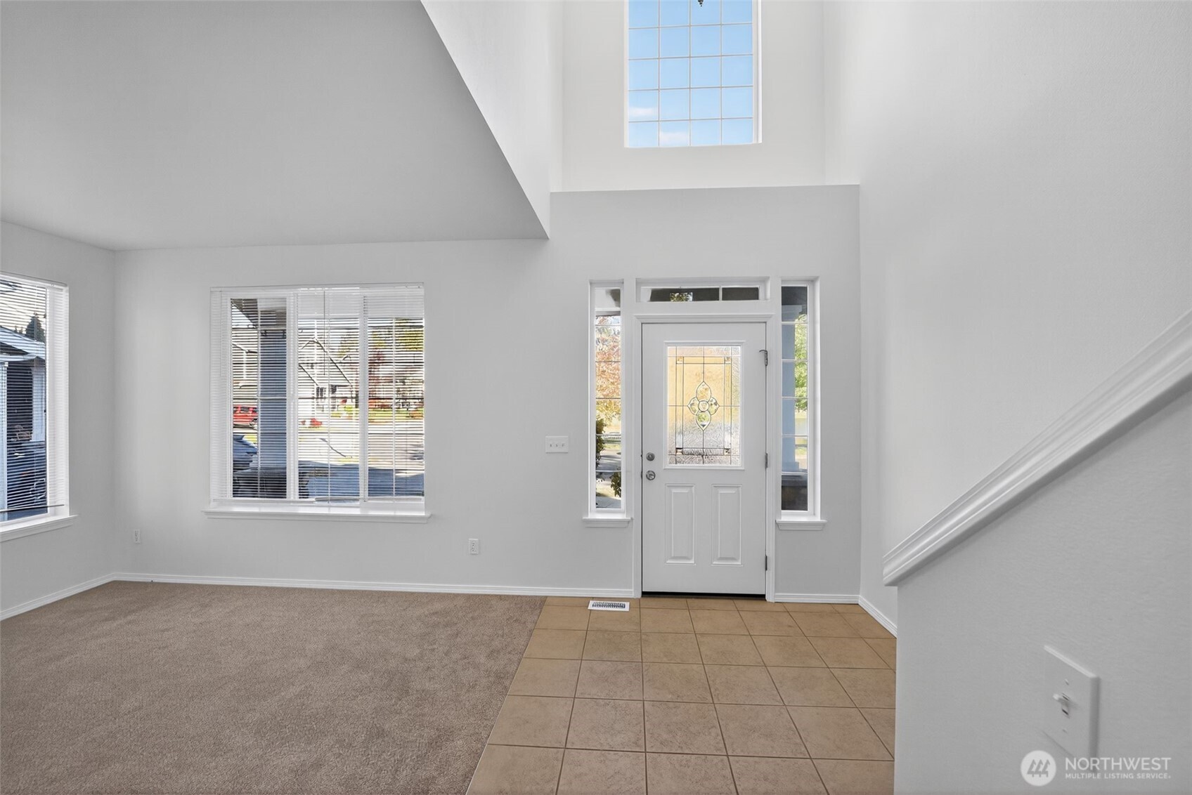 1005 Eagle Avenue Southwest Orting, WA 98360 - Photo 3 of 34 an empty room with windows