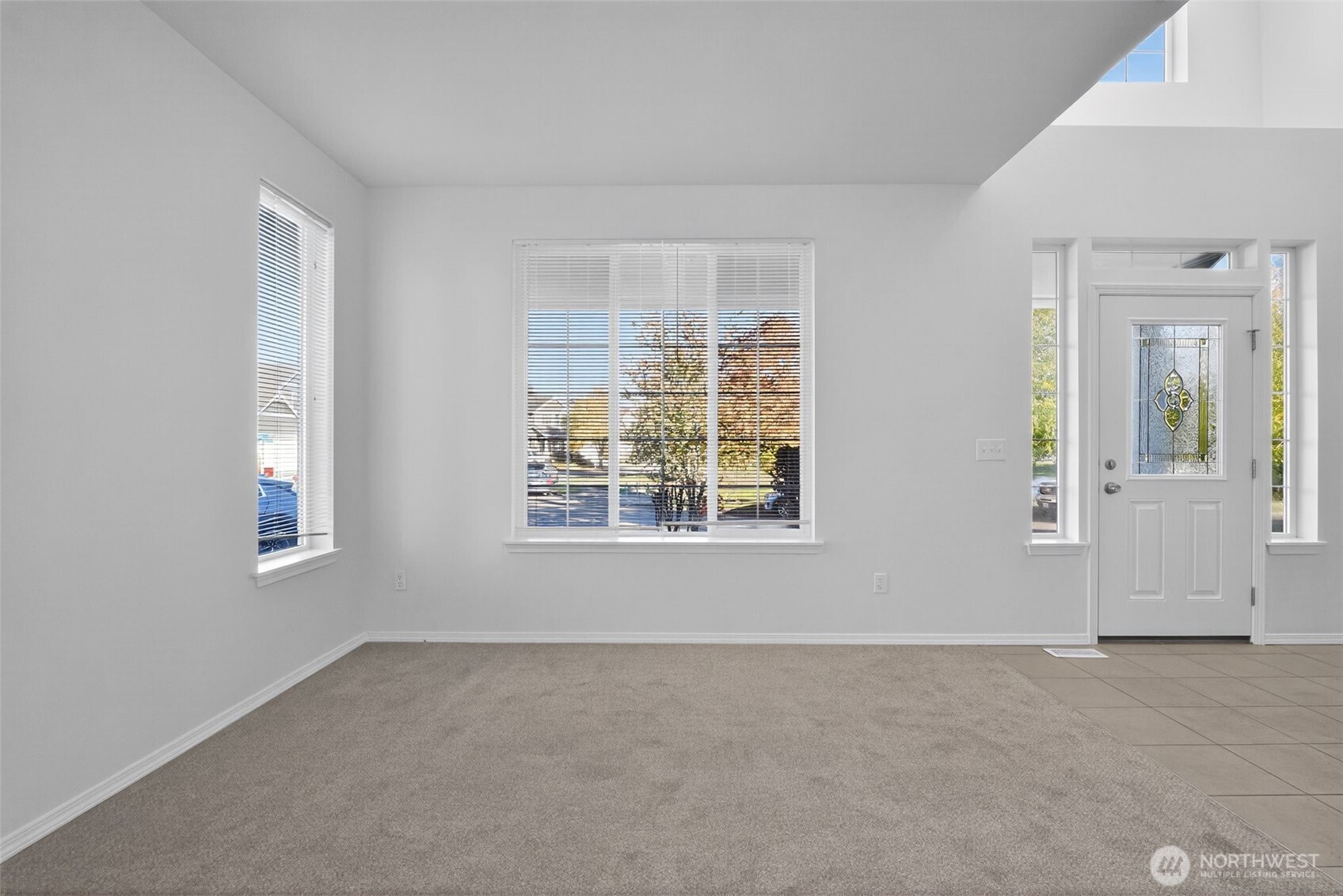 1005 Eagle Avenue Southwest Orting, WA 98360 - Photo 4 of 34 an empty room with windows
