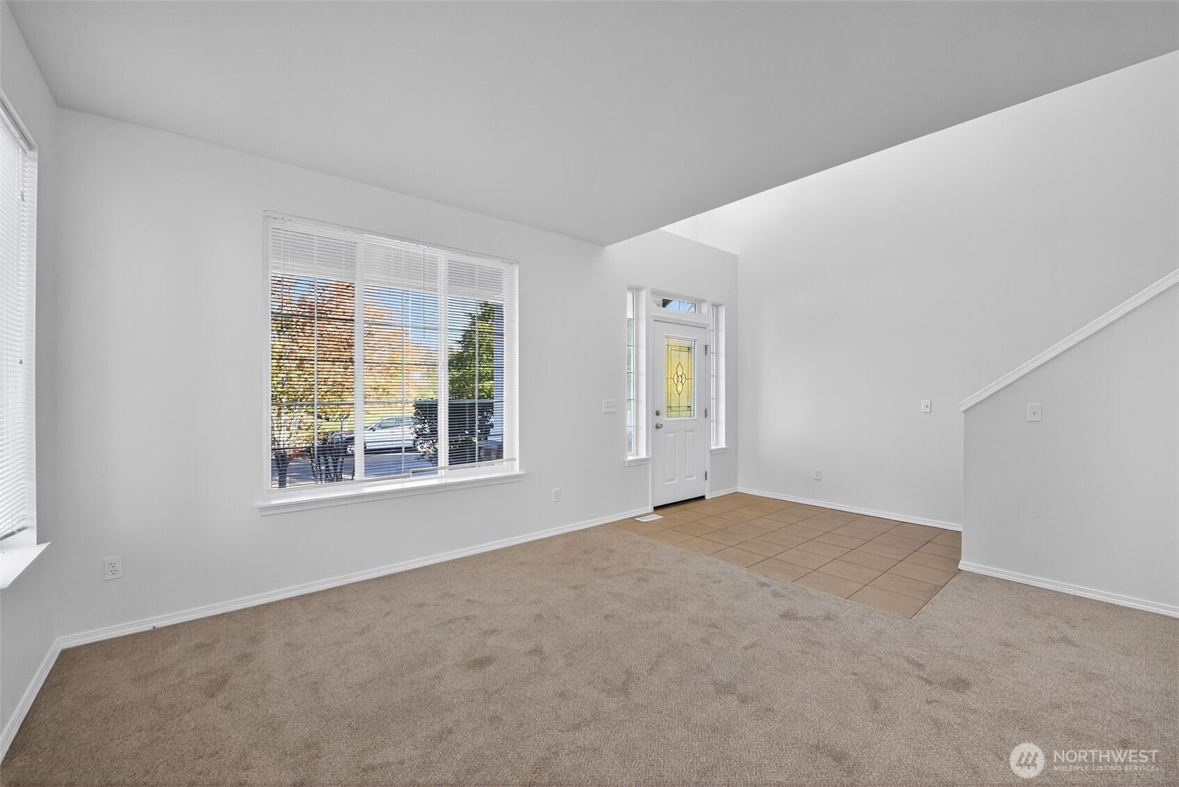 1005 Eagle Avenue Southwest Orting, WA 98360 - Photo 5 of 34 a view of an empty room with a window