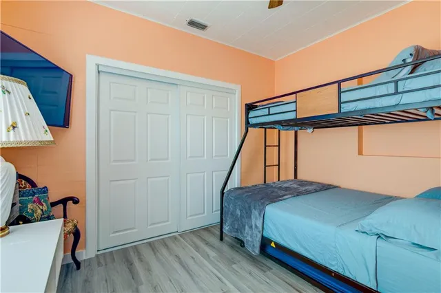 a room with furniture and wooden floor