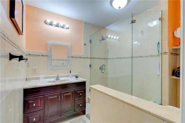 a bathroom with a sink and a washing machine